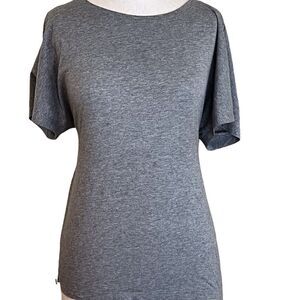 Simple gray T-shirt with open back.